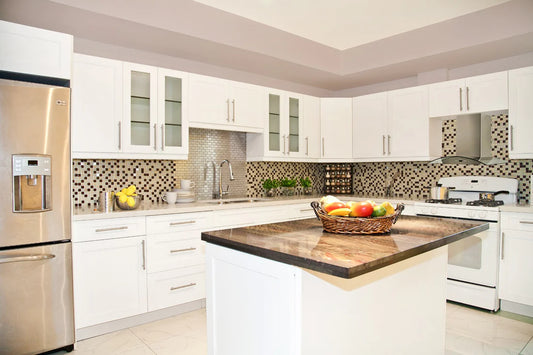 Kitchen with white RTA frameless shaker cabinets and brown kitchen countertops