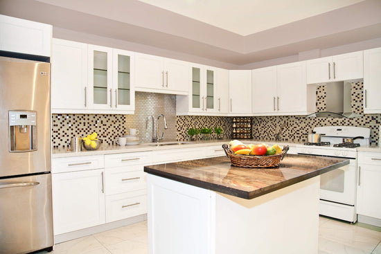 Modern kitchen with frameless RTA white shaker cabinets and granite countertops